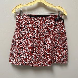 Terry bike skirt.  Built in chamois.  Red/black print. Side fasten. Large